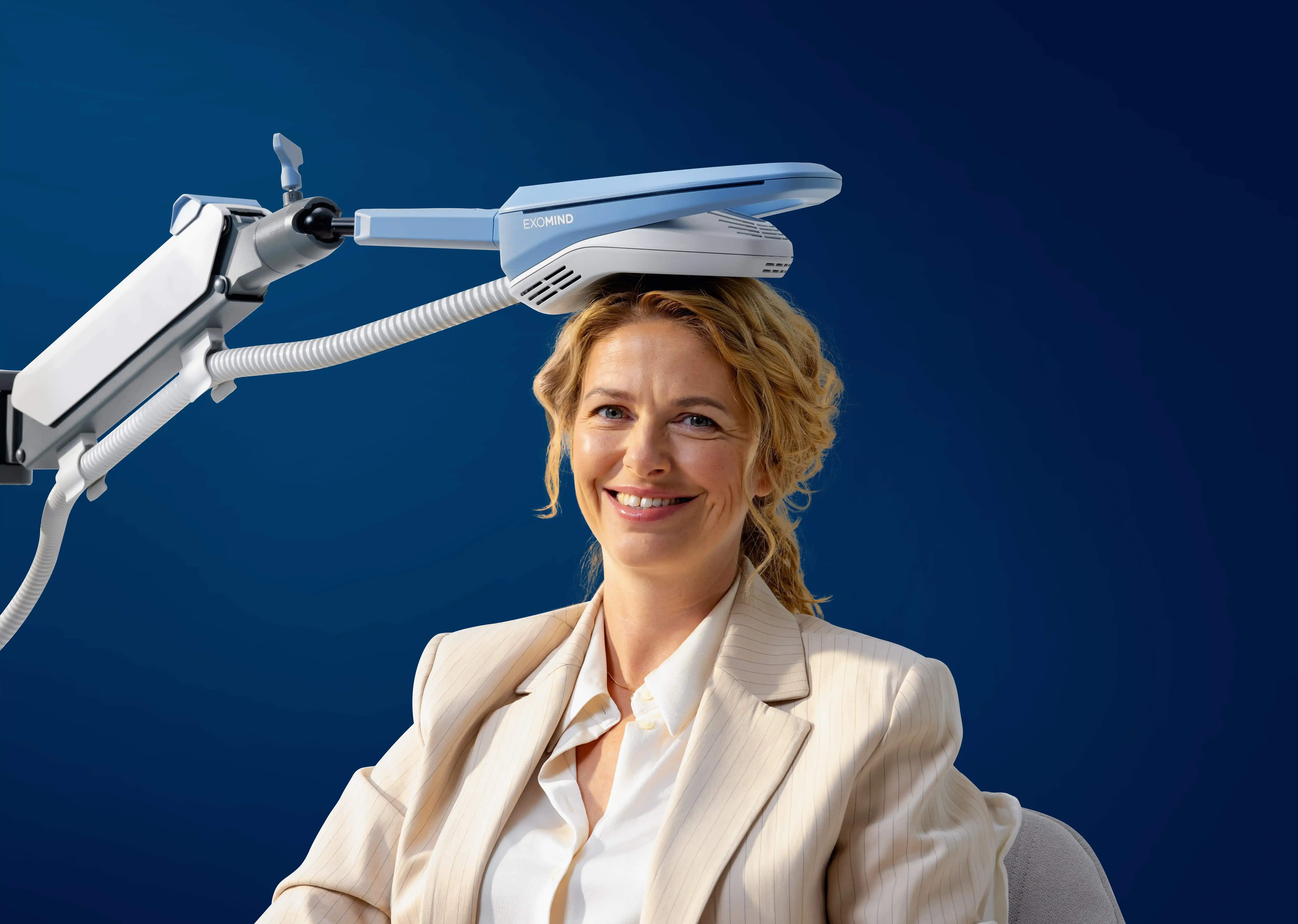 Focused professional at a desk representing mental clarity supported by TMS therapy in Suwanee, GA