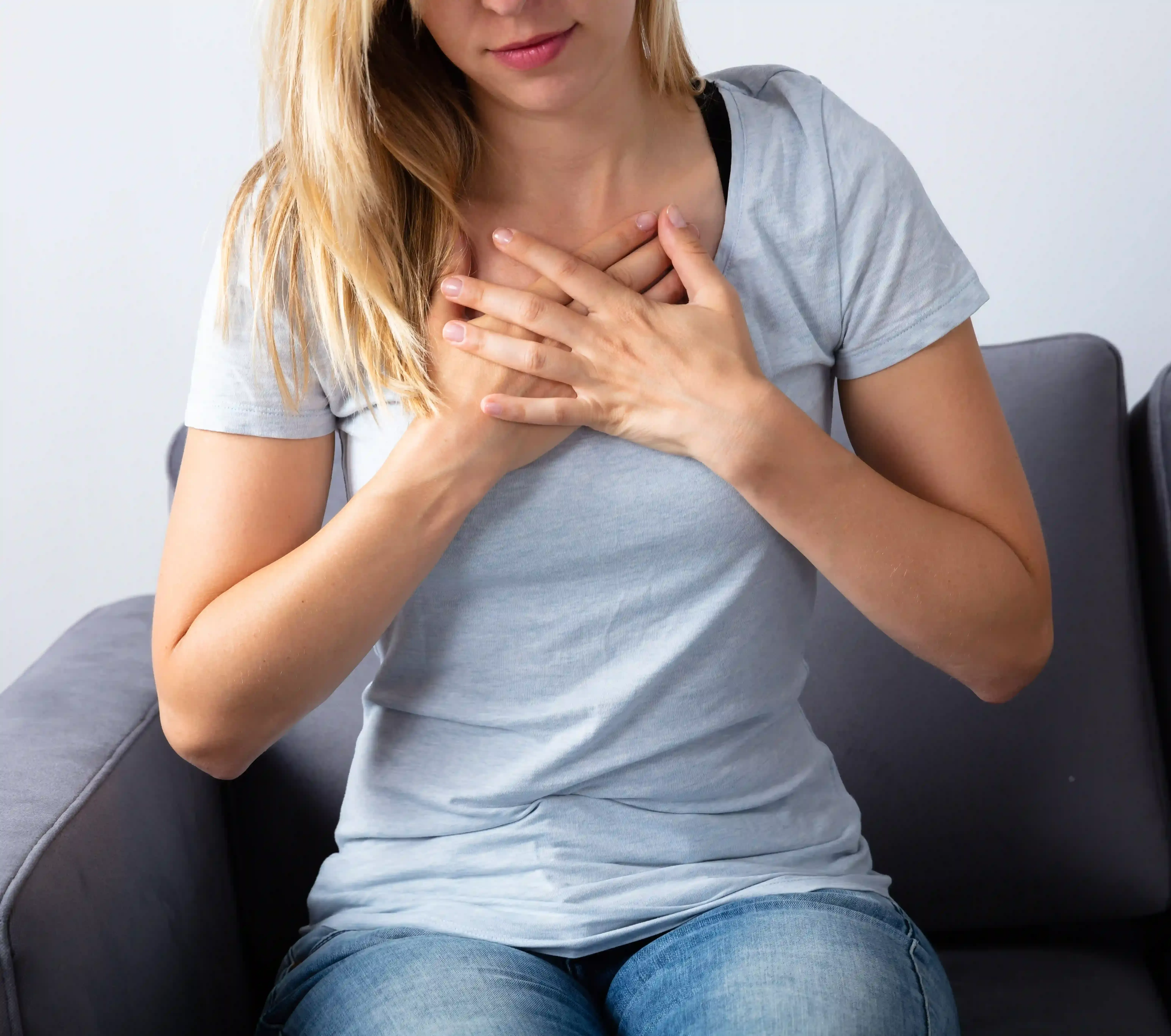 Suwanee GA patient recognizing common signs and symptoms of chronic GERD acid reflux