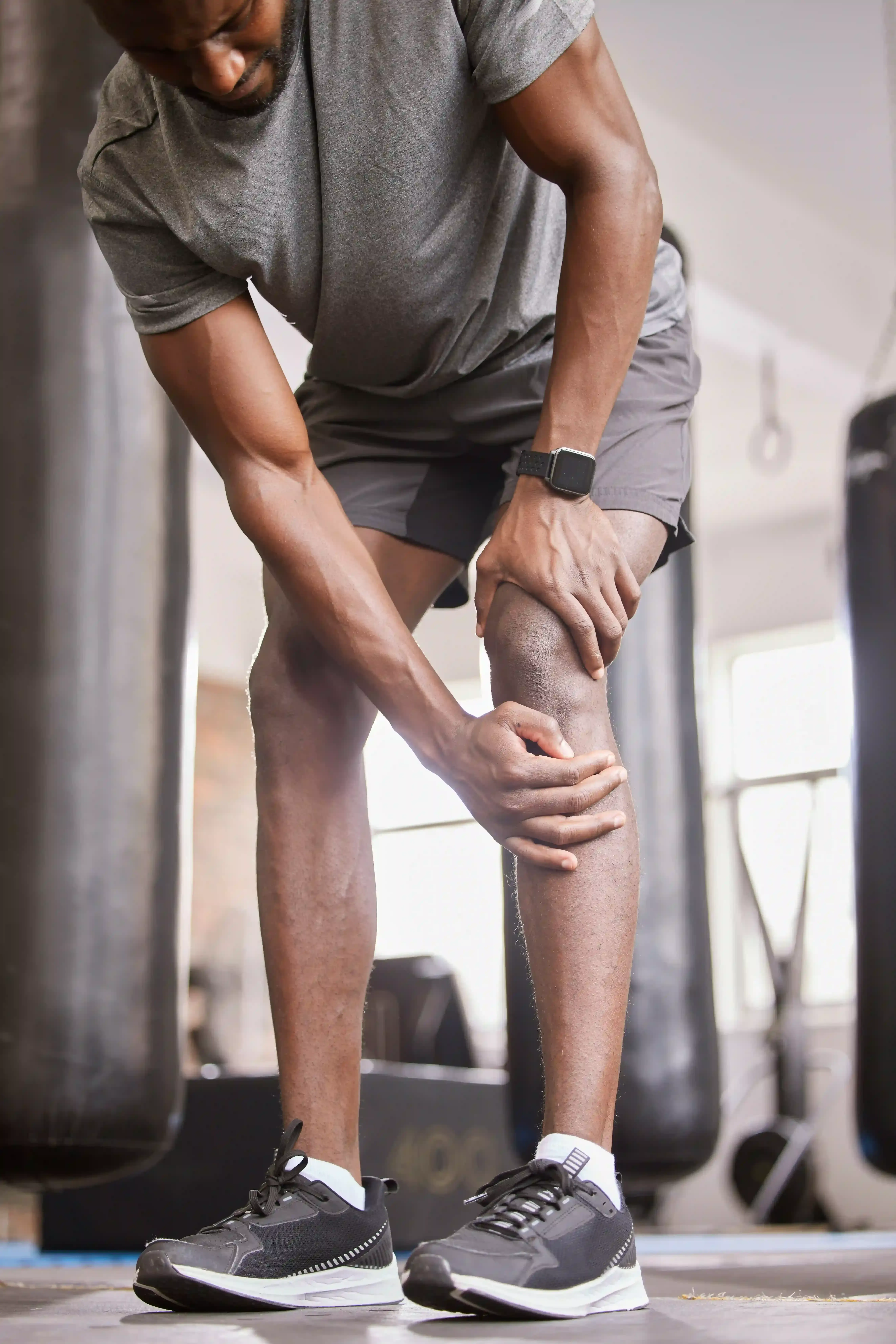 Person noticing leg swelling and visible veins that signal a treatable underlying vein condition