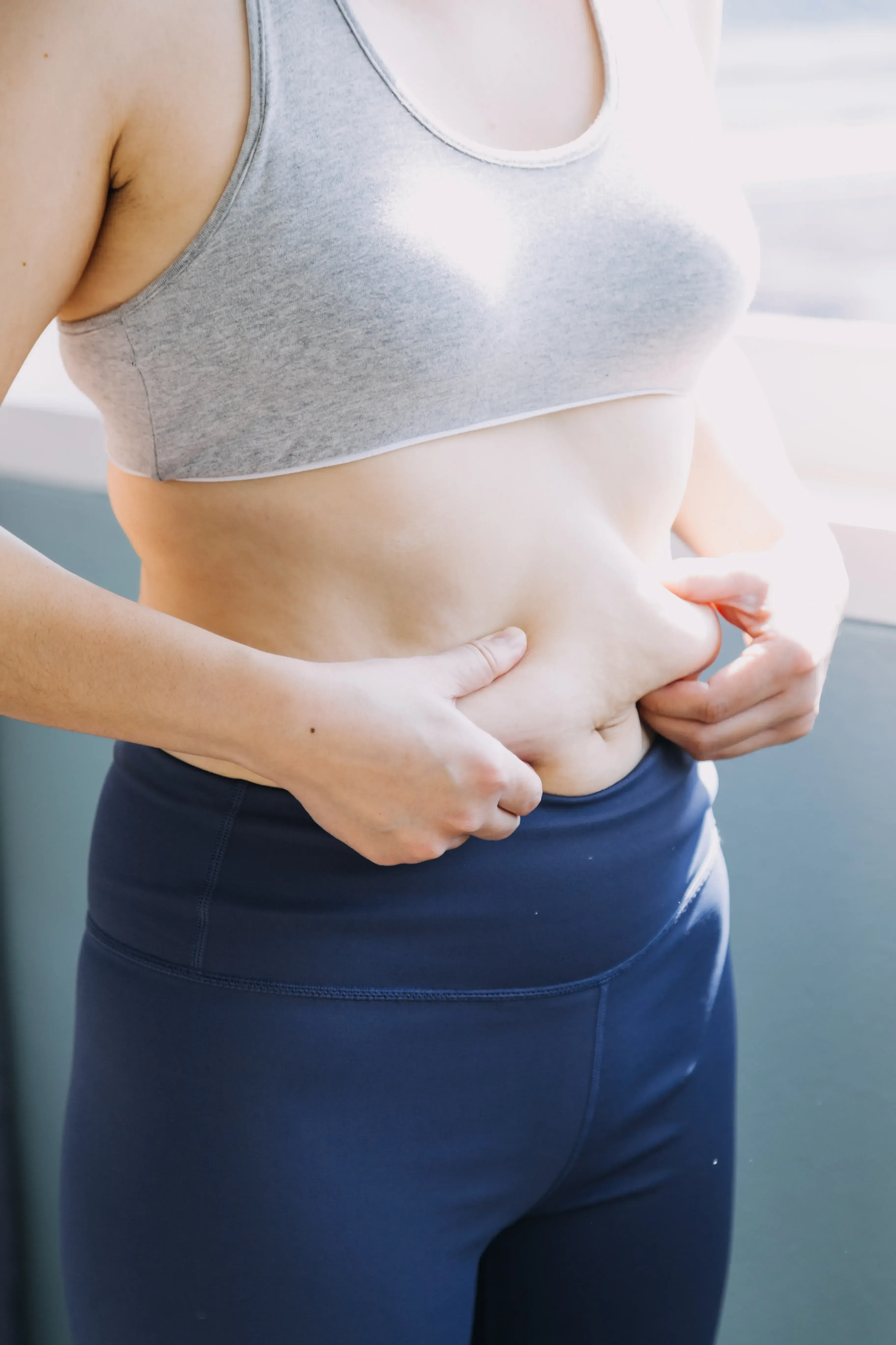 Physician reviewing metabolic syndrome risk factors with a patient during evaluation