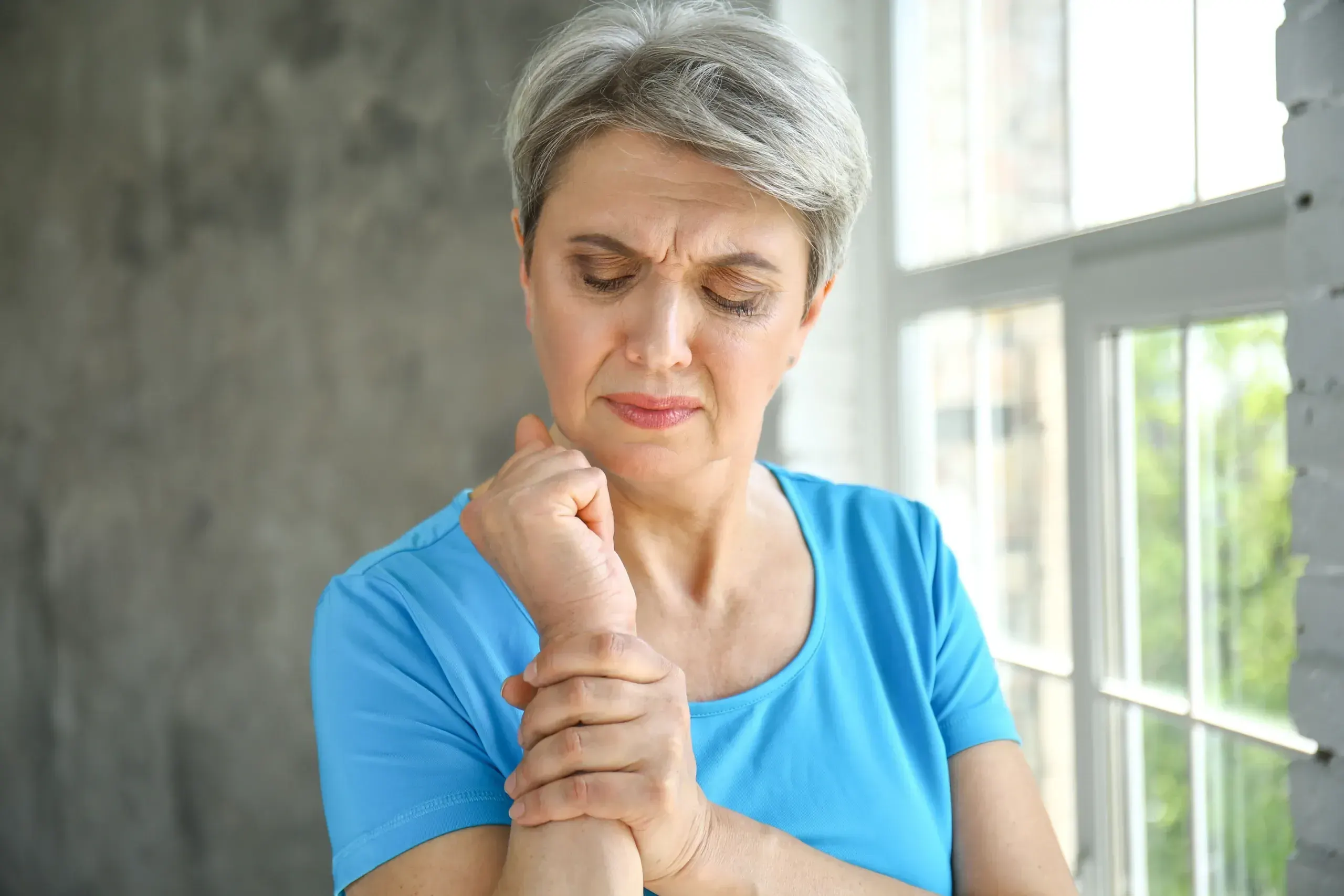 Older adult considering low bone density testing after a minor fracture at Bodiatrics Suwanee GA